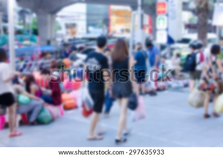 atmosphere around people walking the streets blur background