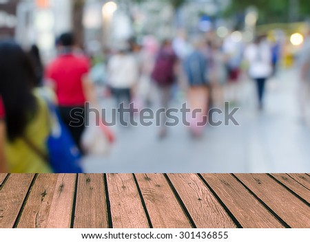 Wood top Blurred walking on the street background. product display template.