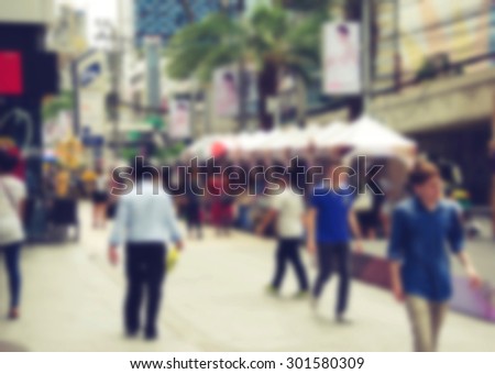 Blur people walking the streets.vintage style