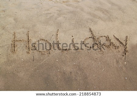 The inscription on the sand - holiday
