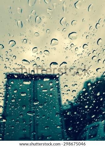 Vintage picture tone, drop of rain on car window