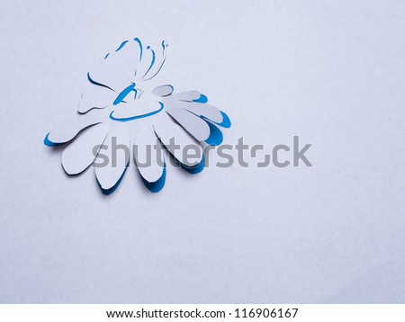 Image of abstract blue flower and butterfly  handmade.Eco background.