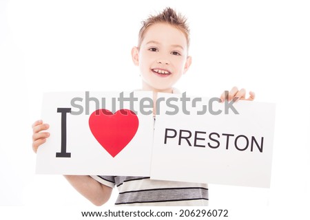 Boy with  sign I love Preston  . Series of boy with English city signs