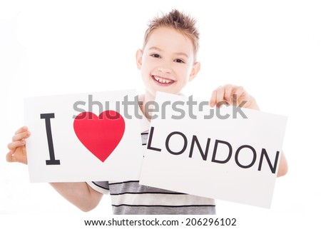 Boy with  sign I love London  . Series of boy with English city signs