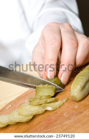Cutting up cucumber