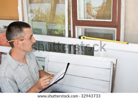 Man measures window