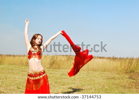 Attractive girl dances east dance