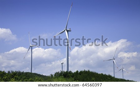 Power generating windmills is running on the hill