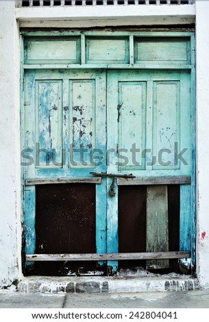 Broken set of blue doors