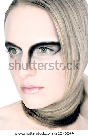 stock photo : Face shot of model with feline makeup and hair