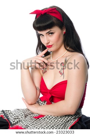 50s pin up clothing. stock photo : Pretty 50's Pin Up style model in housewife clothing