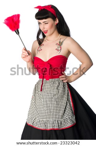 stock photo : Pretty 50's Pin Up style model in housewife clothing winking 