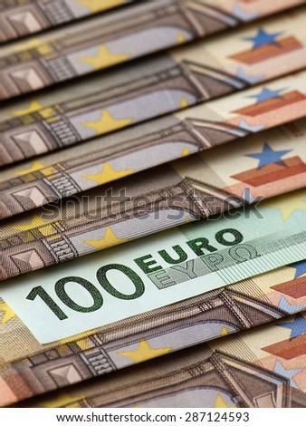 One hundred euro, which is located among many banknotes of Europe
