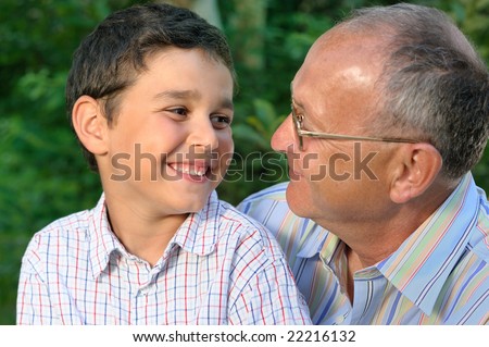 Smiling Grandfather and kid