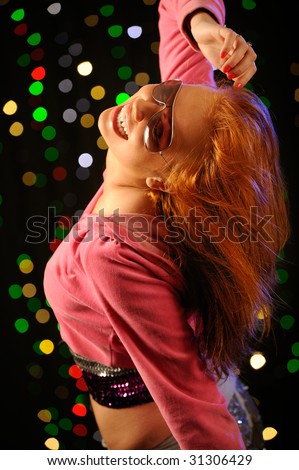 stock photo Beautiful redhead dancing