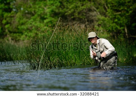 fly fisherman casting