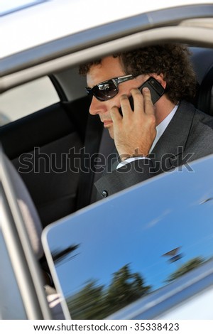 Portrait of businessman inside the car