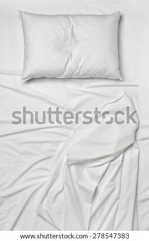 studio shot of bedding sheets and pillows