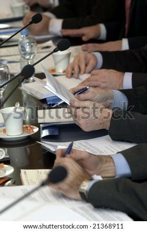 close up of conference meeting notebooks and documents