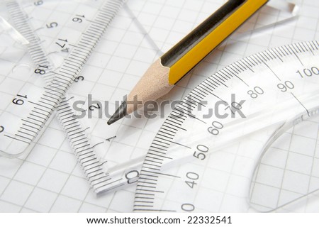 close up of different rulers and  school supplies