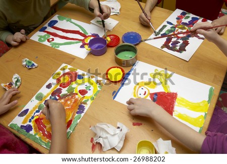 little children painting during art class