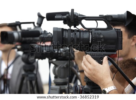 close up of conference meeting and broadcasting camera