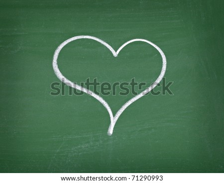 stock photo love hearts drawing on a school chalkboard