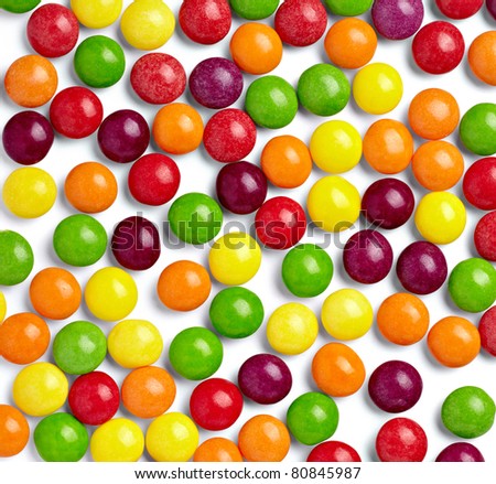 close up of colorful candies on white background with clipping path