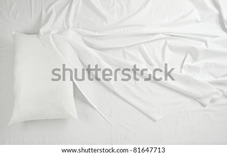 close up of bedding sheets and pillow