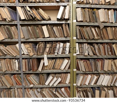 close up of old vintage files in a storage room