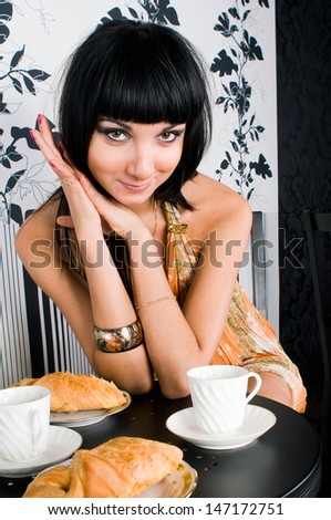 Portrait of the beautiful woman in restaurant