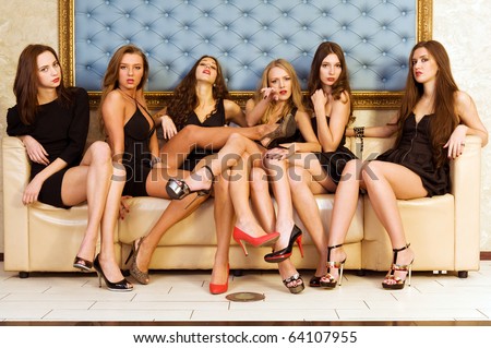 Group of the beautiful model in a black dresses