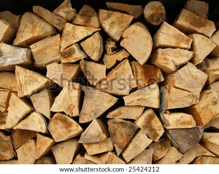 firewood in wood-shed texture