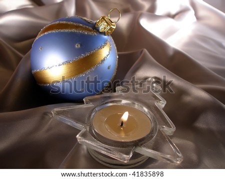Dark blue with gold christmas decoration and candlestick as fir