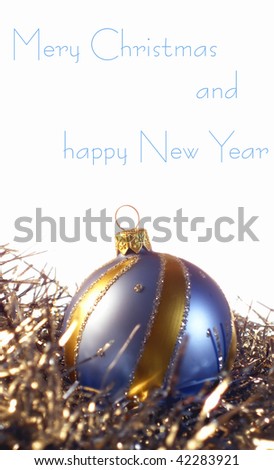 Dark blue with gold sphere on tinsel the Christmas decorations are isolated on a white background