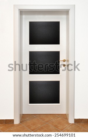 Close up of closed wooden door in the room