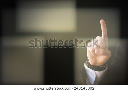 Business Man pushing on a touch screen interface