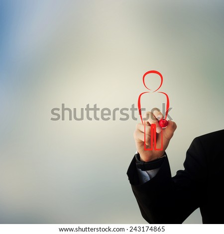 Business and advertisement concept. Close up of businessman drawing a person