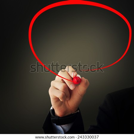 Business and advertisement concept. Close up of businessman drawing a chat bubble