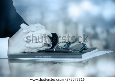 Business worker signing the contract to conclude a deal