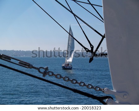 Sailboat as seen through the ropes of the â??Star of India?�.
