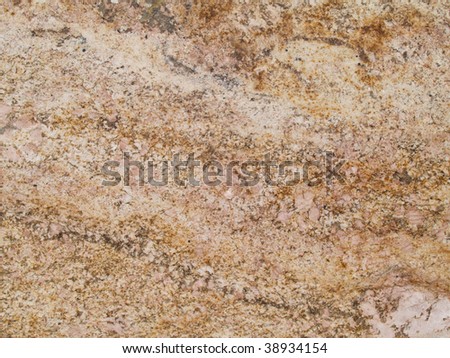 Marble texture in shades of tan, pink, brown and gray.
