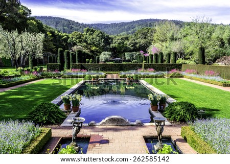beautiful symmetrical english style garden with pool