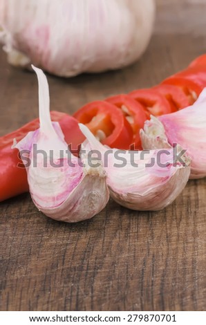 Hot pepper and garlic with wooden table