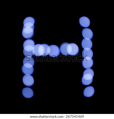 letter of Christmas lights on a dark background, the letter H, \