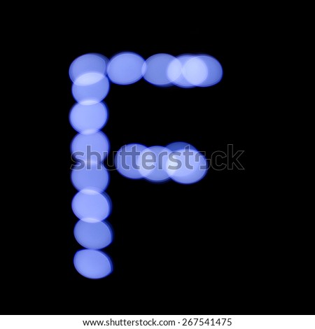 letter of Christmas lights on a dark background, the letter F, \
