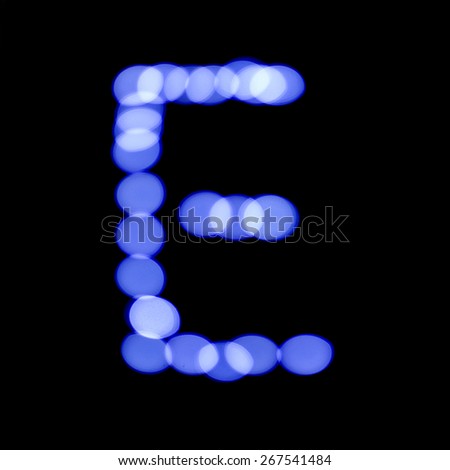letter of Christmas lights on a dark background, the letter E, \