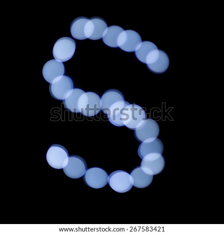 letter of Christmas lights on a dark background, the letter S, 