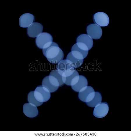 letter of Christmas lights on a dark background, the letter X, \