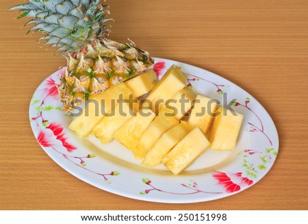 Sliced of pineapple on a white dish